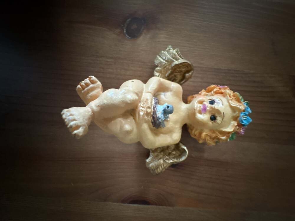 Resin Cherub Angel Figurine with Gold Wings and Floral Hair Crown Holding Bird